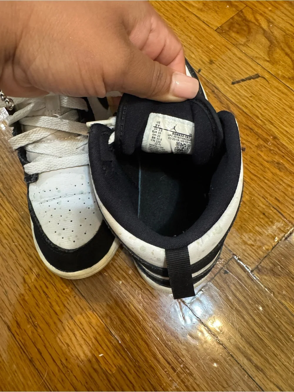 Air Jordan Black and White High Top Sneakers